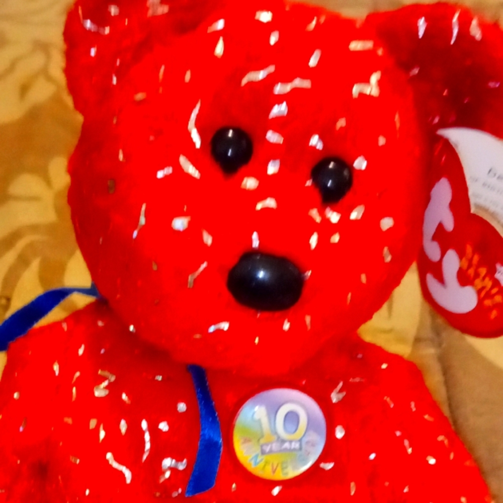 Ty beanie baby one of the special ones. He was made Jan. 22th 2003